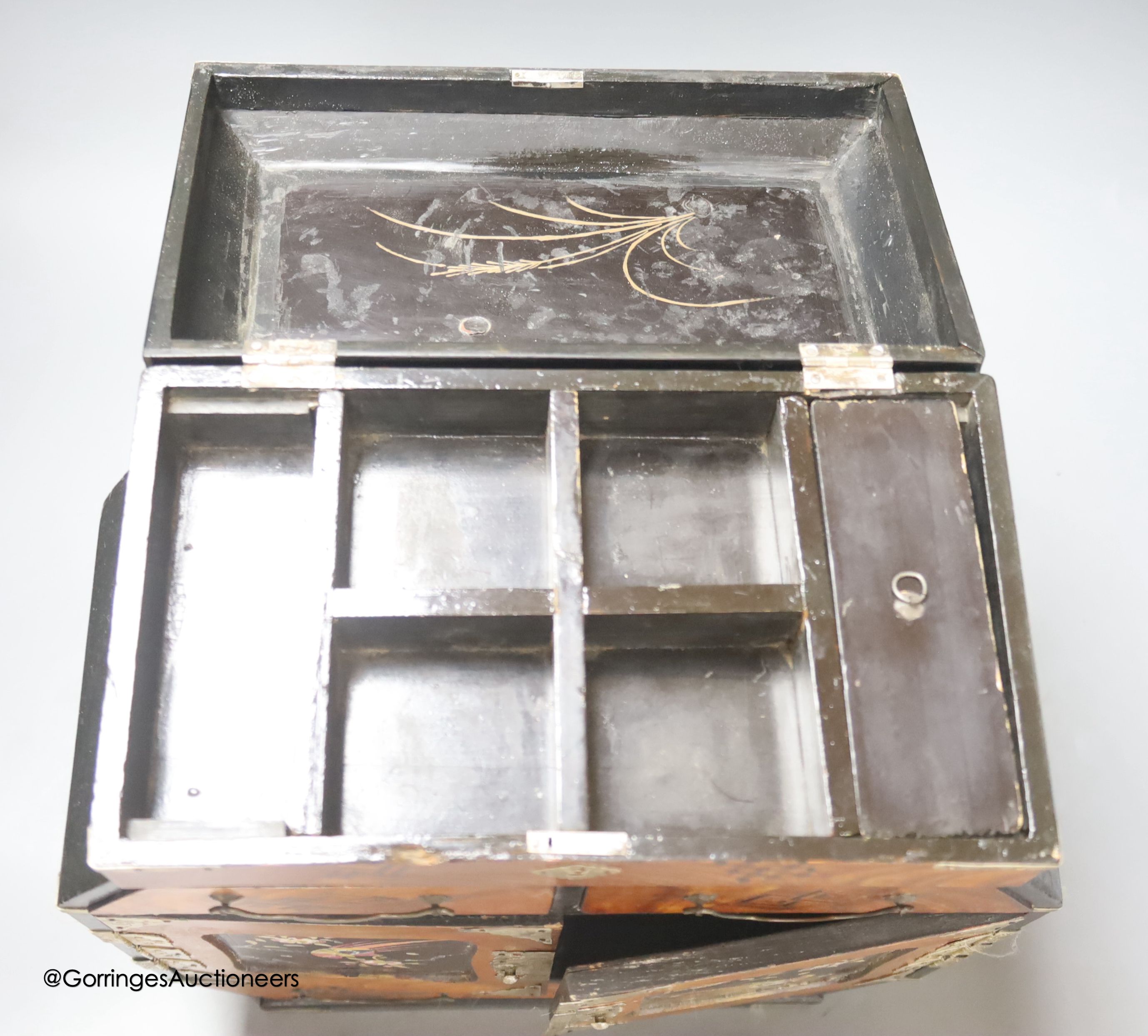 A Japanese lacquer and white metal mounted inlaid table cabinet, height 37cm